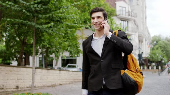 Smiling Large Young Guy Business Look Walking Down