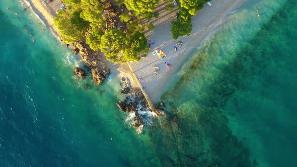 Croatia. Aerial view on rocks and forest. Vacation and adventure. Rocks and turquoise water. 