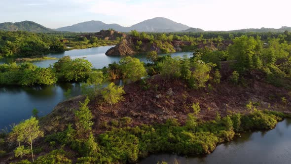 Aerial fly over abandoned mining site