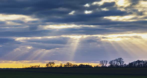 Sunbeams Moving Across the Sky