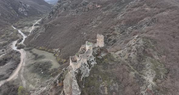 Aerial view of Drisi Castle situated on a mountain above the Tedzami River gorge. Georgia 2022