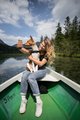 Woman travel in italy on boat with dog - PhotoDune Item for Sale