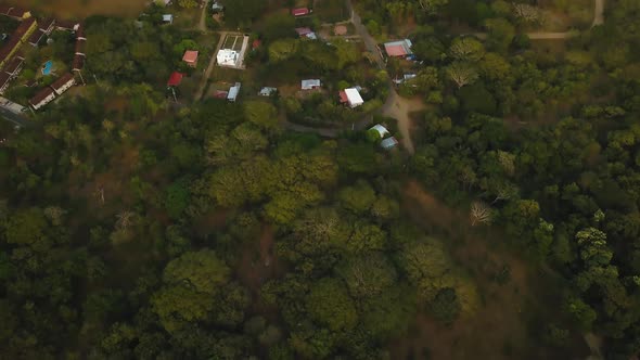 Stunning aerial view of a shantytown in a tropical jungle.