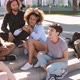 Stylish Multiethnic Friends Chilling on Street - VideoHive Item for Sale