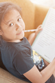 Portrait of a cute little girl studying - PhotoDune Item for Sale