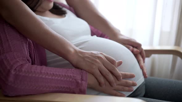 Pregnant Couple Feels Love and Relax at Home