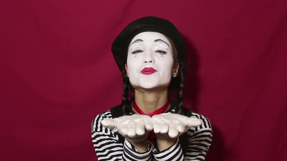 Beautiful Girl Mime Sends Air Kiss