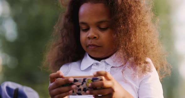 Portrait of a Teenager with a Smartphone