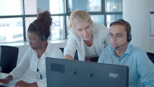 Young Female Boss Call Center Operators