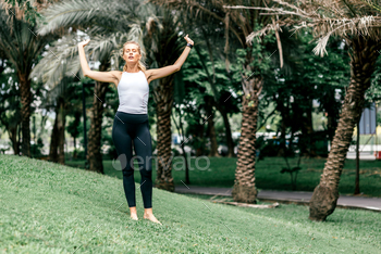 Yoga everyday keeps the doctor away. Woman feeling peaceful and relaxed. / Photodune