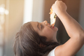 Happy Weekend. Little girl at home eating pizza smiling joyful close-up blurred background - PhotoDune Item for Sale
