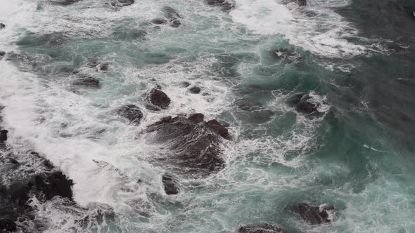 Calming Footage of beautiful blue ocean waves crashing the rocky shore at Loch Ard Gorge 12 Apostles