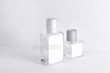 two glass package aroma perfume bottles / Photodune