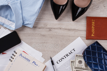 Office woman's flatlay on wooden table. / Photodune, Misc
