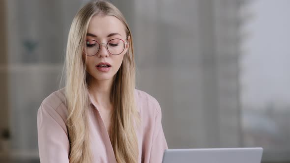 Caucasian Business Woman Wearing Glasses Girl Freelancer Secretary Girl Working with Laptop in