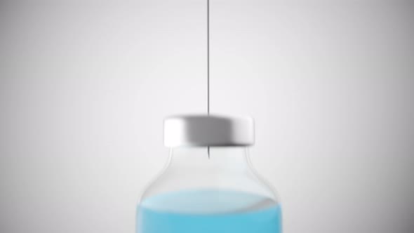 Long syringe needle drawing blue liquid from a container on a bright background.