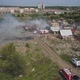 Aerial View of Fire in Village, Fire Engines Are Parked Near, Smoke and Smouldering Ruins - VideoHive Item for Sale