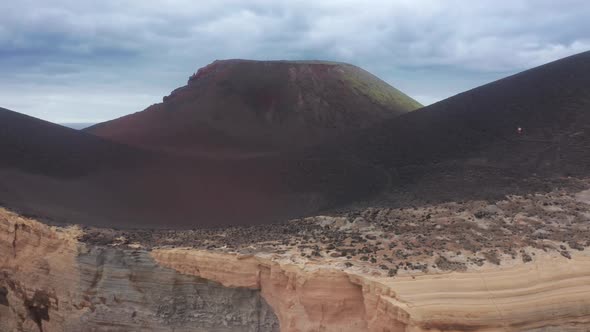 Male Hiker Walking on Road of Capelinhos Volcano Faial Island Azores Portugal