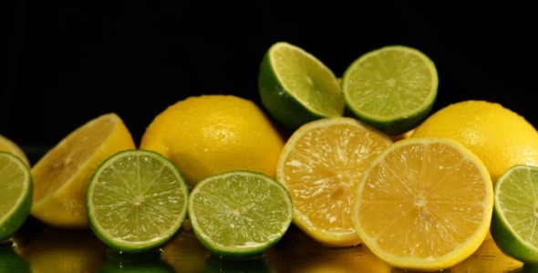 Wet Lemons And Limes On Black With Slider