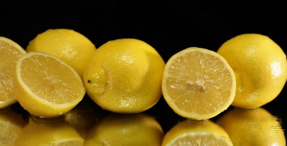 Wet Lemons On Black With Slider Shot