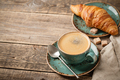 Cup of coffee and fresh croissant - PhotoDune Item for Sale