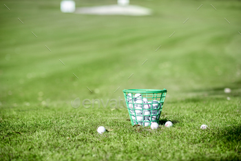 Basket with golf balls outdoors / Photodune, Misc