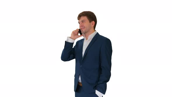 Handsome Young Businessman Talking on the Phone on White Background