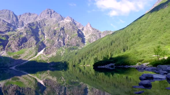 Beautiful lake in the middle of the Tatras mountains at dawn, Poland