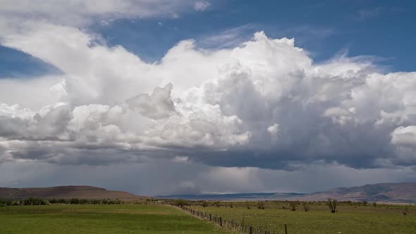 Thunderstorm building and moving over the landscape bringing wind and rain