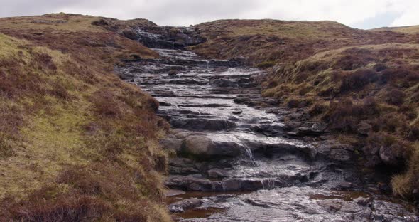 Wide Angle of a Stepping Stone Waterfall and Stream in the Faroe Islands