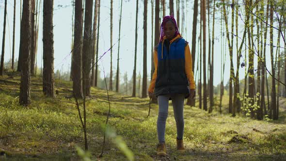 Hiker African Black Backpacker Woman on Hiking Adventure Feeling Freedom Walking in Forest Female