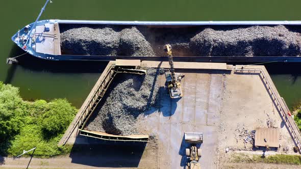 Metal scrap being loaded into a ship for recycling. 