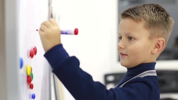 Boy Writing on Blackboard at School Solving Exercises Education Reform Child Learning