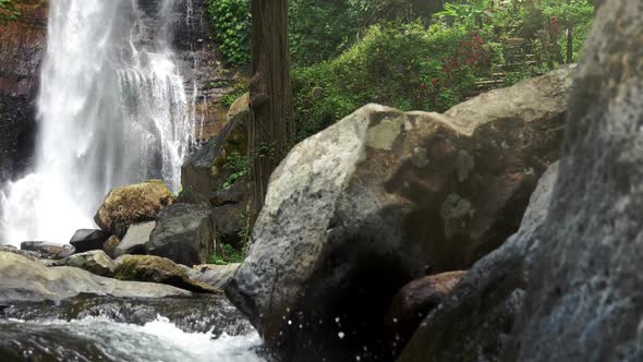 Beautiful Waterfall in the Tropics. Gimbal Stabilized Slow Motion Shot . Bali, Indonesia