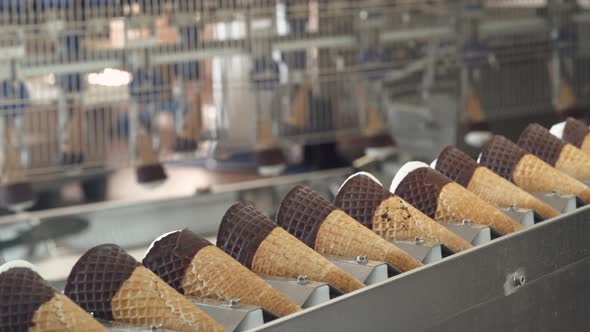 Ice Cream Production, Transportation Waffle-cone with Plombir Ice Cream on Conveyor, Production Line