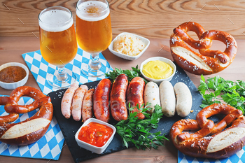 Oktoberfest table with traditional food / Photodune, Misc