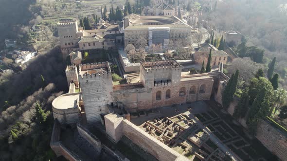 Orbiting over Plaza de Armas and Quebrada tower, the Alhambra Fortress, Iconic moorish monument. Gra