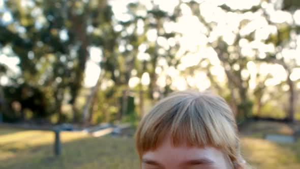 Portrait of smiling girl standing in boot camp