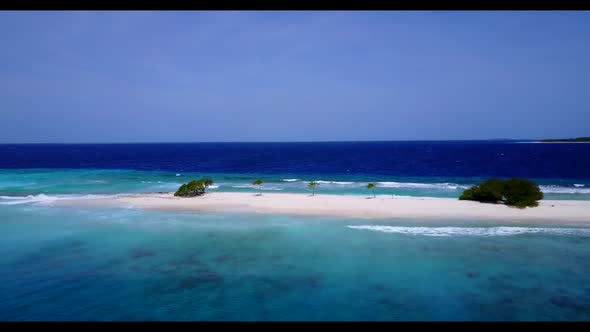 Aerial above tourism of relaxing lagoon beach vacation by transparent lagoon with white sand backgro