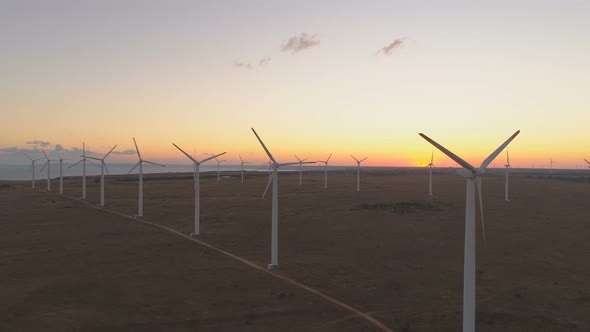 Wind Turbines Farm at the Sea Coast Producing Green Energy. Wind Turbines at Black Sea Coast