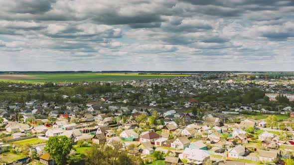 Small Town In Russia . Aerial View Of Small Town. Bird's-eye View Summer. Drone Hyper Lapse. .