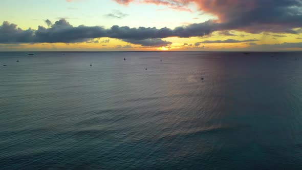 Sailboats Traveling Across the Pacific Ocean on Tourist Vacation in a Hawaiian Sunset, Sailing The W