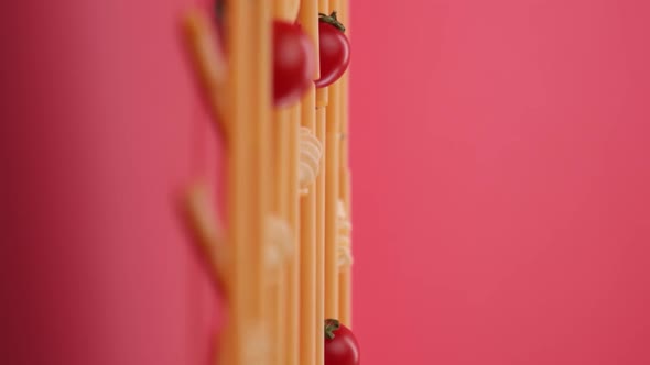 Vertical video: Pasta and spaghetti in a plate