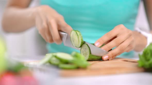 Closeup Woman Hand Cutting Fresh Organic Cucumber Using Knife Cooking Healthy Food