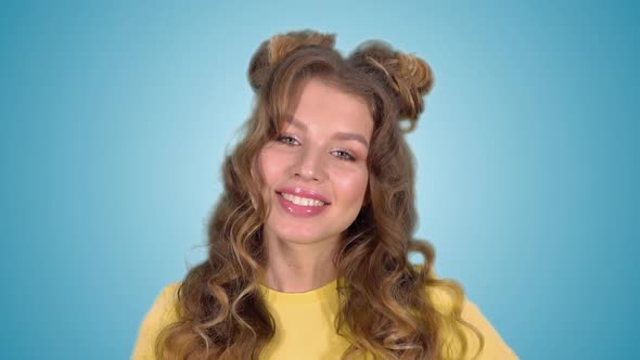 Portrait of a Beautiful Cheerful Girl Smiling Having a Good Mood