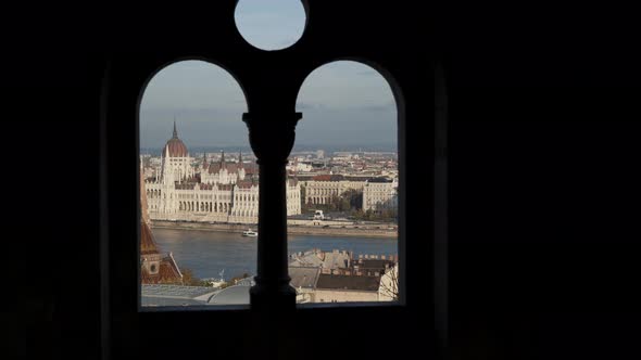 Handheld Shot of the Fisherman's Bastion Overlooking the Parliament in Budapest