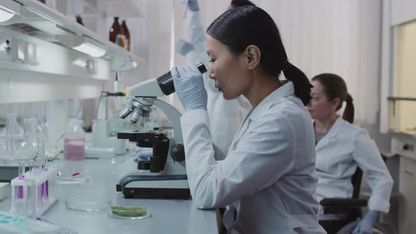 Slowmo of Scientists Working in Lab