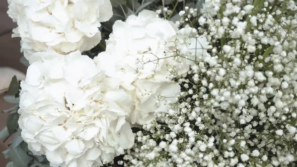 Bouquet of Gypsophila Paniculata and Chrysanthemum in White Colors Closeup Slow Motion