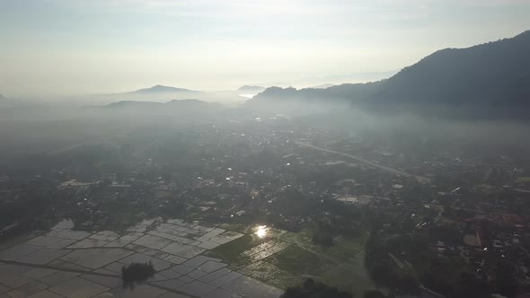 Aerial view misty morning at small town / Videohive