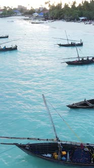 Boat Boats in the Ocean Near the Coast of Zanzibar Tanzania Slow Motion Vertical Video